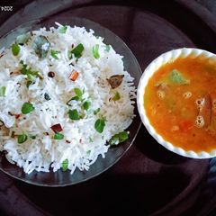 A picture of Restaurant style tasty yummy jeera rice and dal fry.