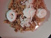 Una foto de fusilli con carne