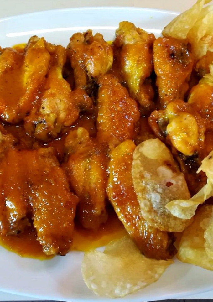 Una foto de Alitas de pollo a la naranja