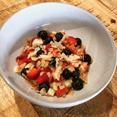 A picture of Strawberry & Toasted Coconut Porridge Bowl.