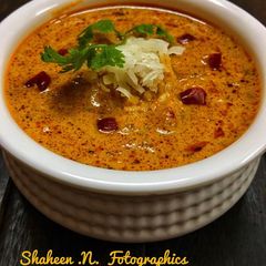 A picture of Chingri Malai Curry.