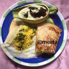 A picture of Andhra style MasalaDosa with Lemon rice.