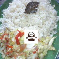 A picture of White Rice wt Cabbage Sauce.