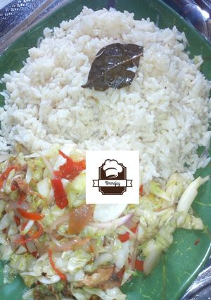 A picture of White Rice wt Cabbage Sauce.