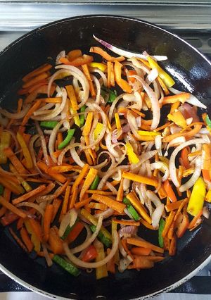 A picture of Carrots, Onion Pepper Stir Fry.