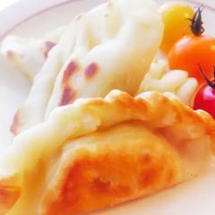 A picture of Pan cooked stuffed pizza.