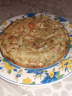 Una foto de Tortilla de patata, zanahoria y pechuga de pollo