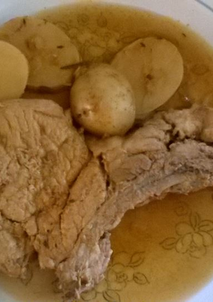 Una foto de Chuletas de cerdo en salsa de cerveza obscura (Olla de cocción lenta-SlowCooker)