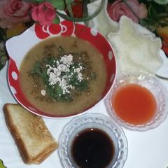 A picture of Porridge dal chicken soup.