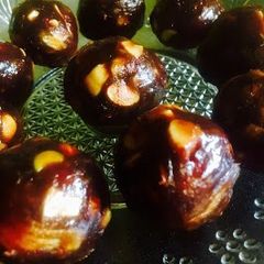 A picture of Dates and nut balls.