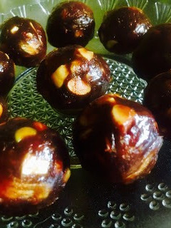 A picture of Dates and nut balls.