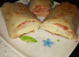 Foto principal de Rollos de jamón y queso en masa filo