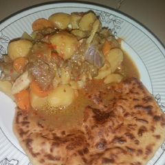 Butter Naan Bread with Potato Soup A picture of Butter Naan Bread with Potato Soup.