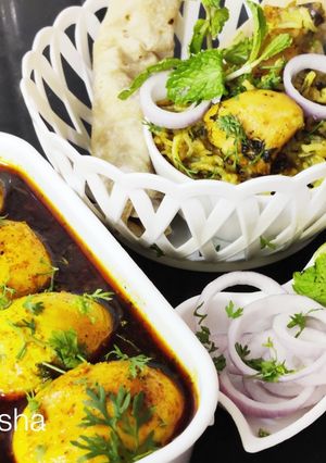 A picture of Spicy Anda Curry Meal(Egg Curry Meal).