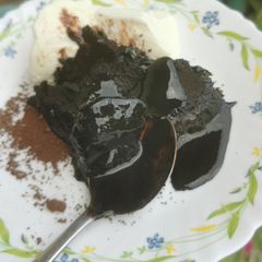 A picture of Hot Fudge Cake with Ice Cream.