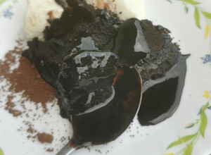A picture of Hot Fudge Cake with Ice Cream.