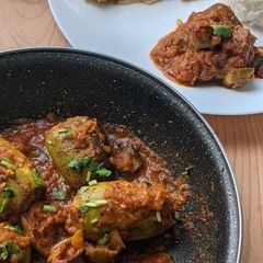A picture of Stuffed Parwal masala / Pointed gourd gravy.