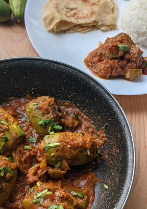 A picture of Stuffed Parwal masala / Pointed gourd gravy.