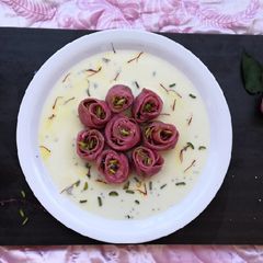 A picture of Rose Momos in Honey loaded Milk.