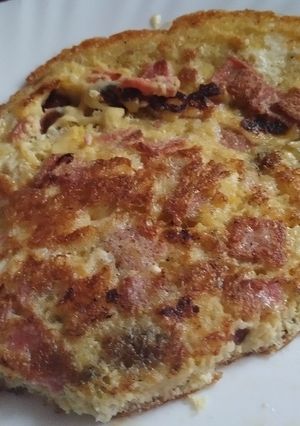 A picture of Fried Eggs with brawn & cheese.