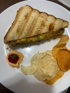 A picture of Grilled cheese chilli sandwich.