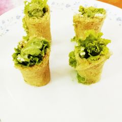 Bread lettuce roll with cream and pumpkin seeds Green chutney A picture of Bread lettuce roll with cream and pumpkin seeds Green chutney.