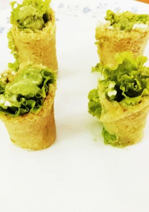 A picture of Bread lettuce roll with cream and pumpkin seeds Green chutney.