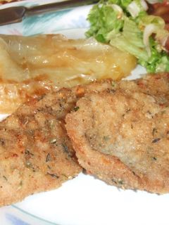 Una foto de Milanesas de cerdo a las finas hierbas