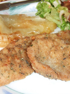 Una foto de Milanesas de cerdo a las finas hierbas