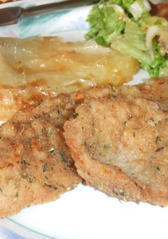 Una foto de Milanesas de cerdo a las finas hierbas