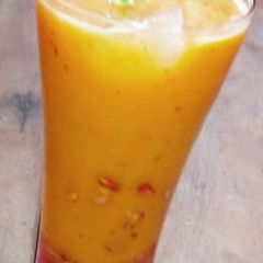 A picture of Carrot Smoothie with fruits.