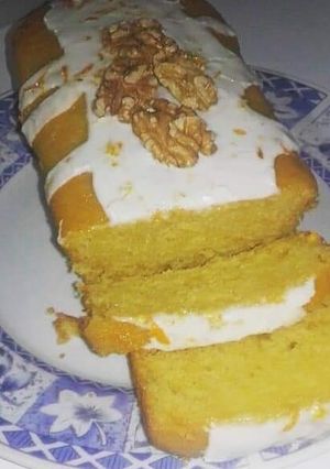 Una foto de Budín de naranja  🍊y nueces 😊