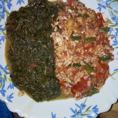 A picture of Fried Eggs with traditional vegetables.