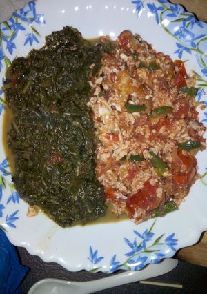 A picture of Fried Eggs with traditional vegetables.