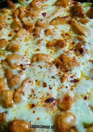 A picture of Chicken Tikka pizza on stove 😋 #ramadankitayari.