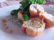 Una foto de pechuga rellena con piña