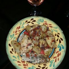 A picture of Fried Sweet potatoes and salmon fish sauce.