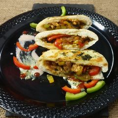 A picture of Shawarma filling in pita bread.