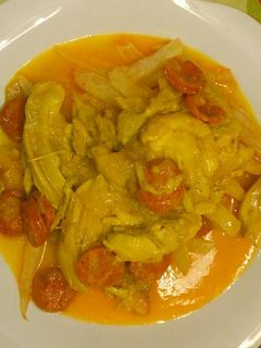 Una foto de Muslos de pollo en dorado