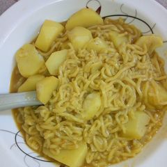 A picture of Indomie with Irish potatoes.