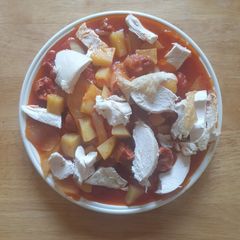 A picture of Diced Potatoes cooked with Chorizo Tomatoes.
