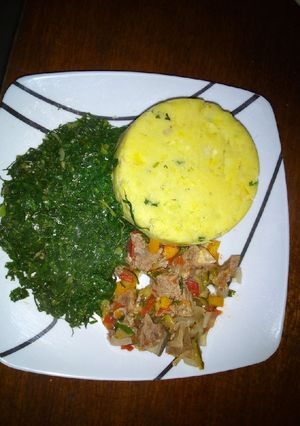 A picture of Mashed matoke, beef and greens.