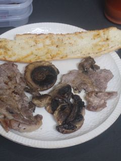 Una foto de Filete de cerdo con champiñones al grill doble