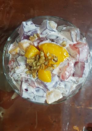 Una foto de Gelatina con crema y durazno