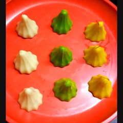 A picture of Tri color Mava modak.