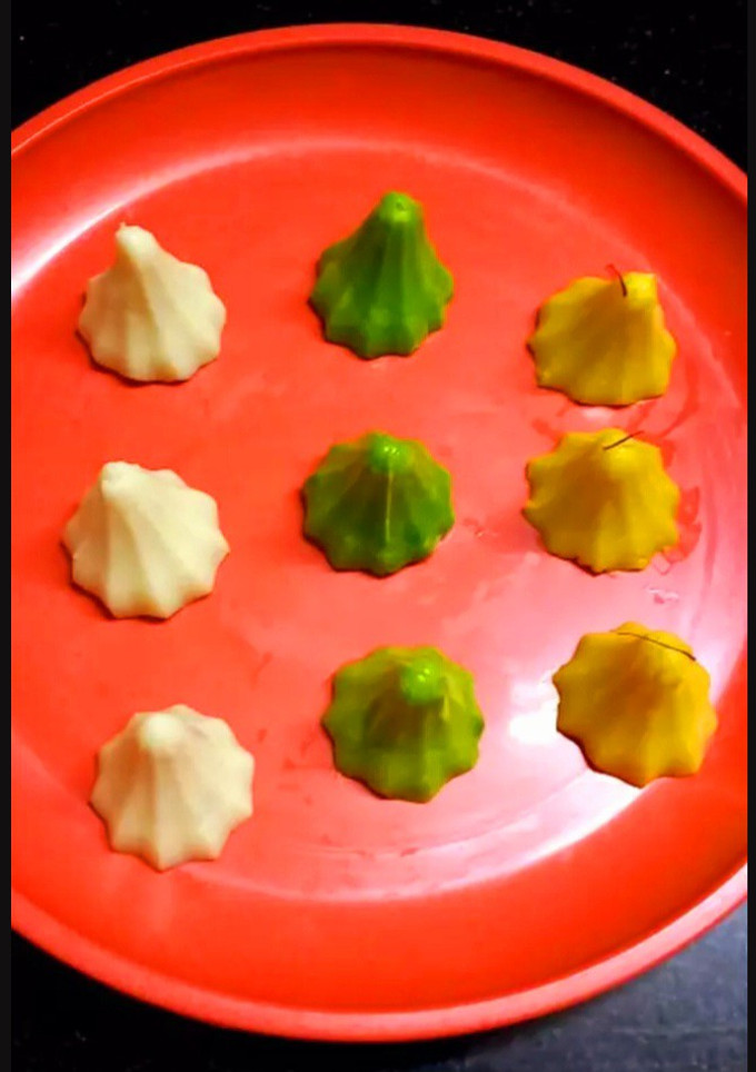 A picture of Tri color Mava modak.