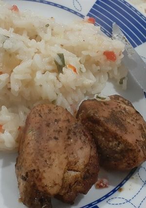 Una foto de Solomillo jugoso al horno con arroz frito