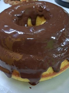 Una foto de Budín de naranja con baño de chocolate 🍊🍫