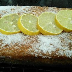 A picture of Zingy Lemon Drizzle Cake.