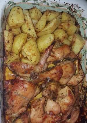 Una foto de Papas y pollo al horno